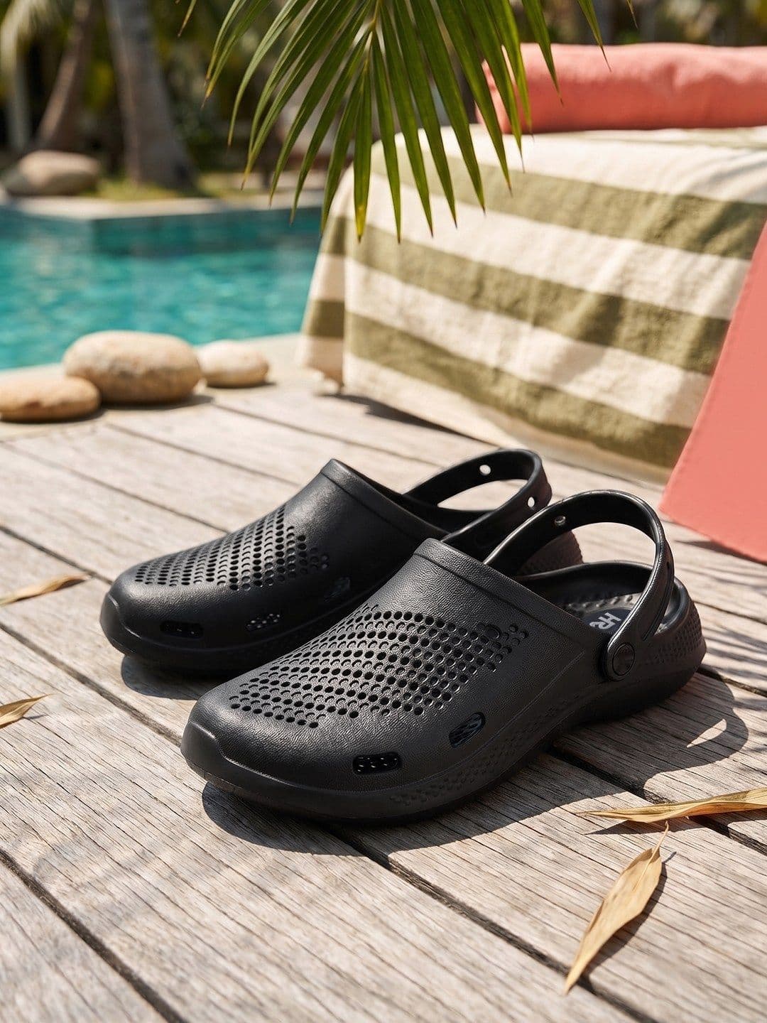 HRX by Hrithik Roshan Men Black Self Design Rubber Clogs - view 1
