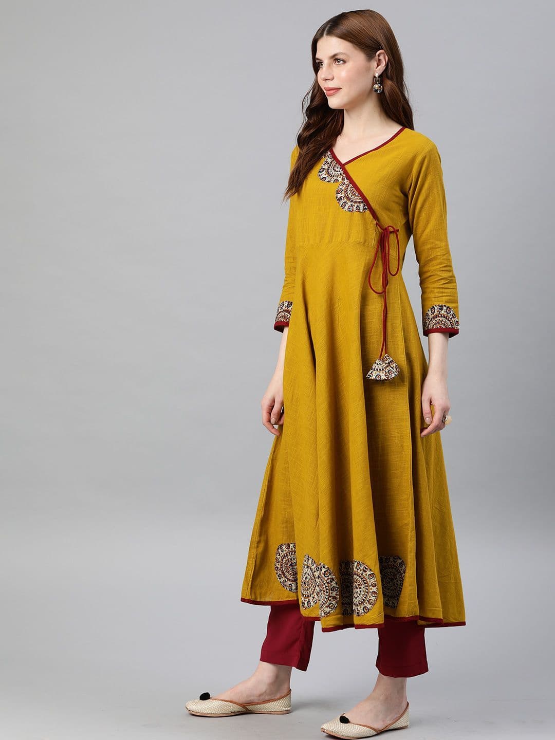 KALINI Women Mustard Yellow Floral Printed Angrakha Anarkali Kurta with Tassel Tie-Up thumbnail 3
