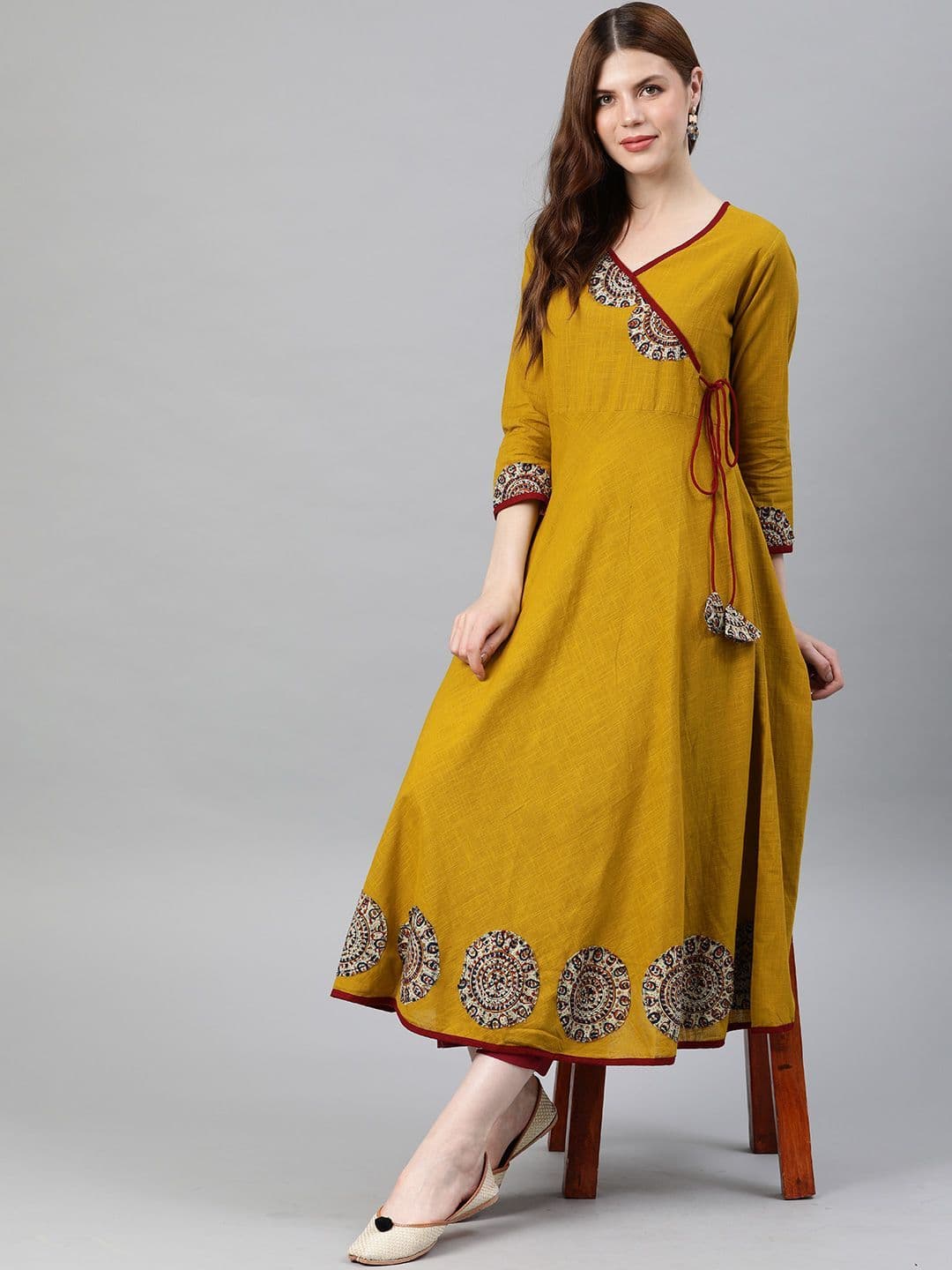 KALINI Women Mustard Yellow Floral Printed Angrakha Anarkali Kurta with Tassel Tie-Up thumbnail 6