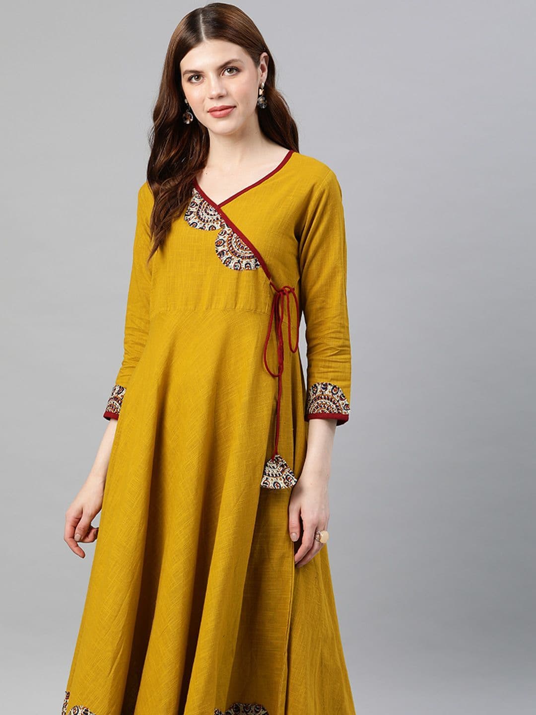 KALINI Women Mustard Yellow Floral Printed Angrakha Anarkali Kurta with Tassel Tie-Up thumbnail 5