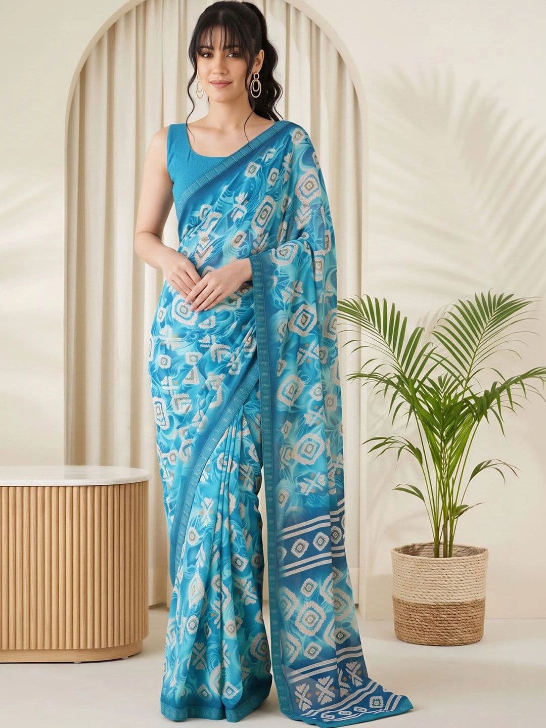 Sangria Batik Sequinned Pure Georgette Designer Saree - view 1