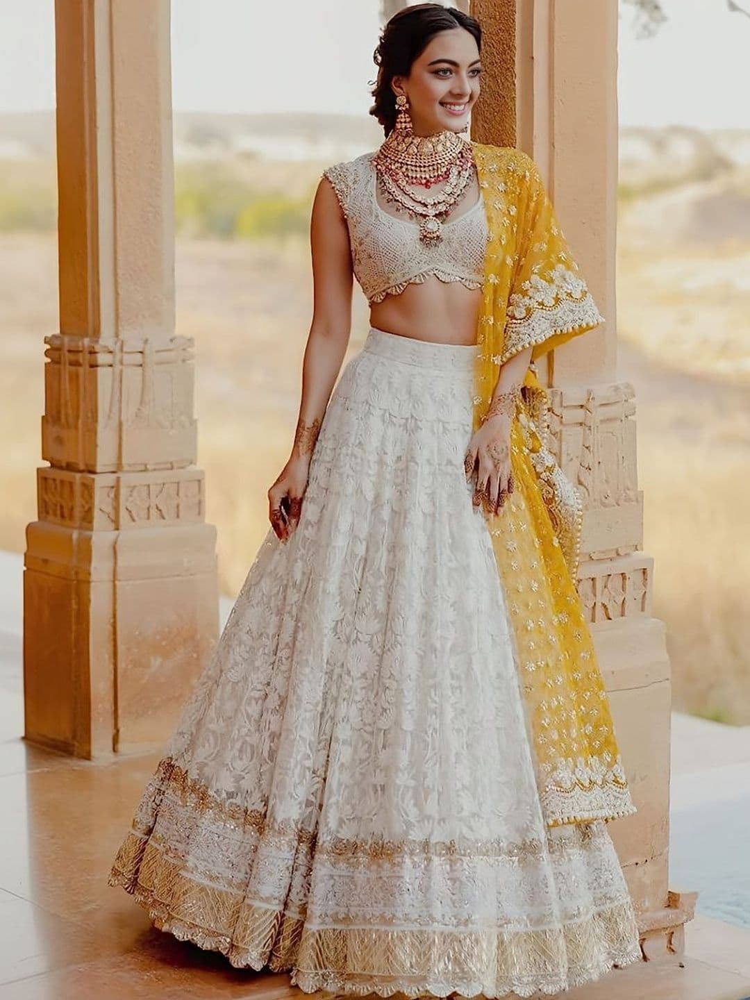 ETHNIC PLUS White Embroidered Sequinned Net Semi-Stitched Georgette Lehenga & Blouse With Dupatta - view 1