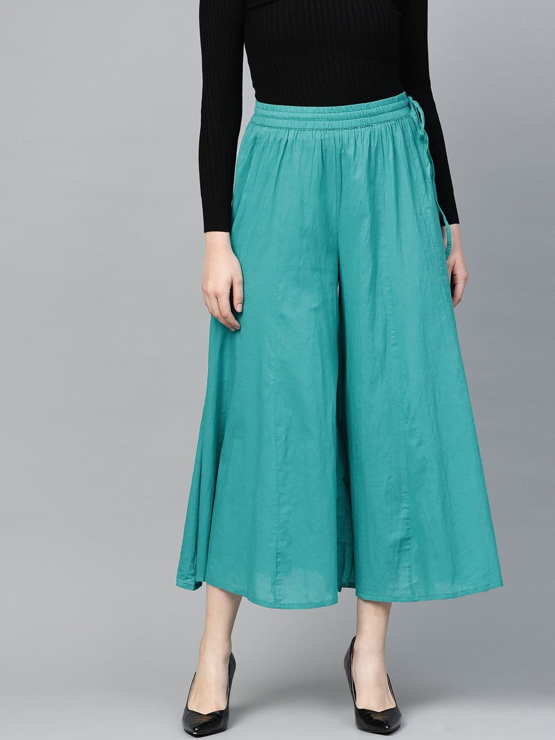 Varanga Women Green Solid Cropped Flared Palazzos - view 1