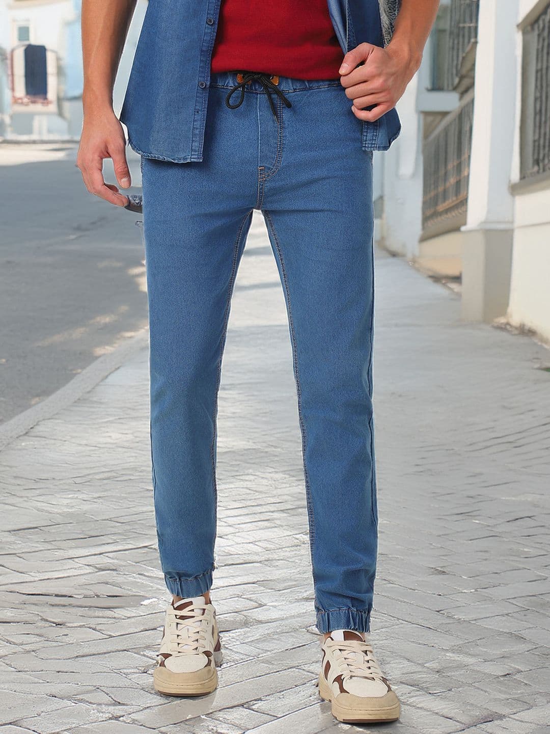Urbano Fashion Men Blue Slim Fit Mid-Rise Clean Look Stretchable Jogger Jeans - view 1