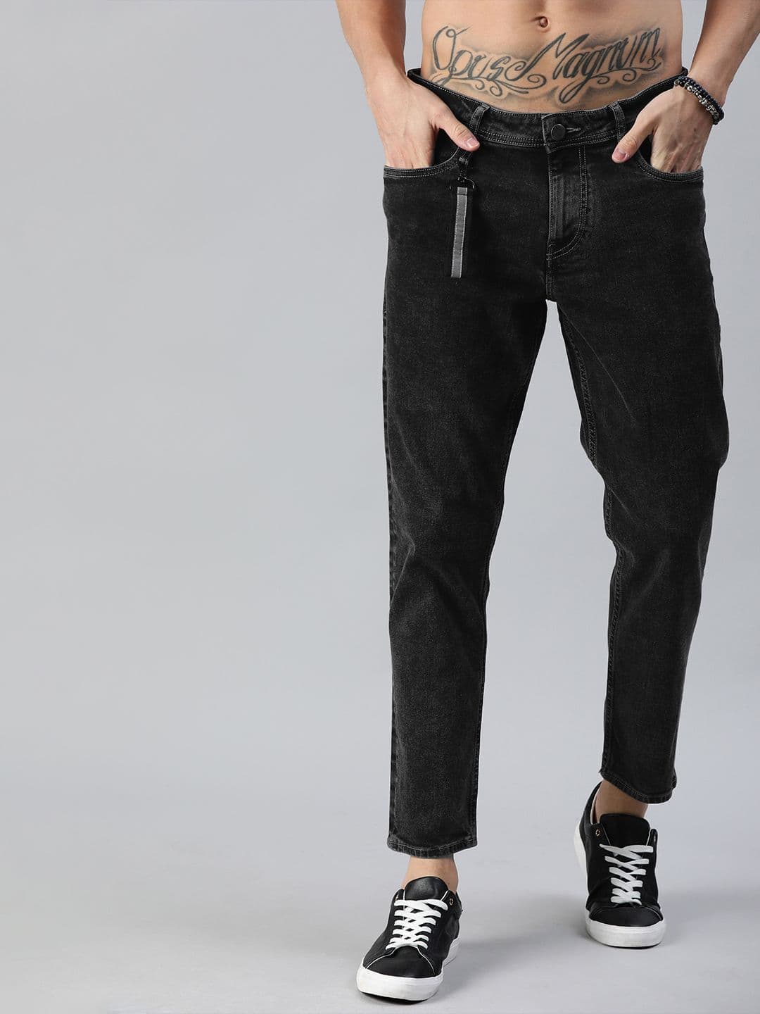 Roadster Men Black Carrot Fit Mid-Rise Clean Look Stretchable Jeans - view 1
