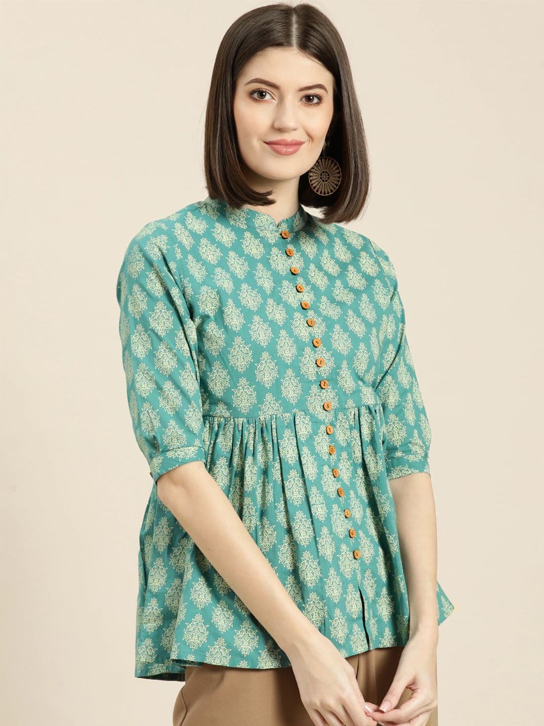 Shae by SASSAFRAS Women Teal Blue & Off-White Printed A-Line Pure Cotton Top - view 1