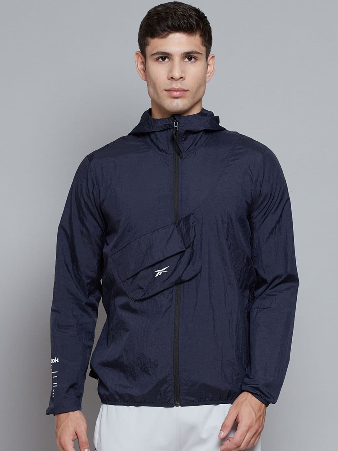 Reebok Men Navy Training Road Trip Woven Packable Hooded Jacket - view 1