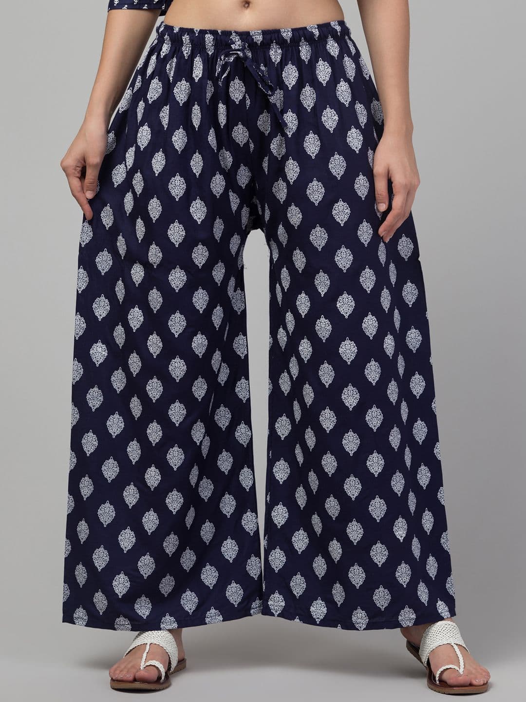 FAMBEE Women Floral Printed Flared Knitted Palazzos - view 1