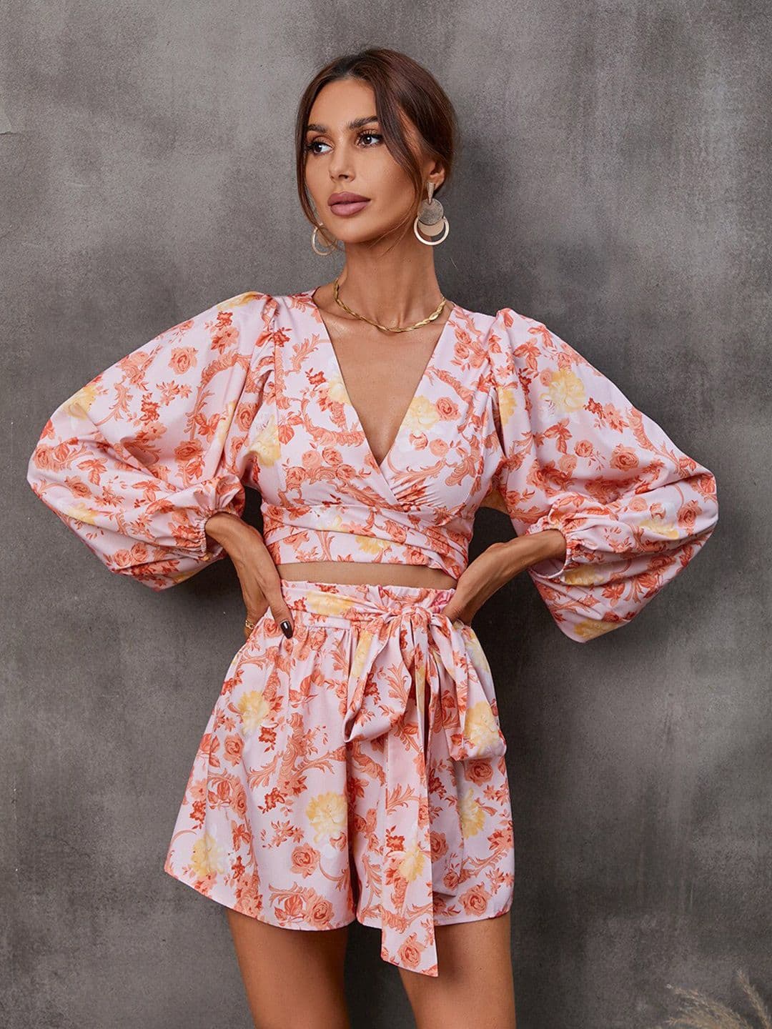 StyleCast Pink Floral Printed Cut-Outs V-Neck Jumpsuit - view 1