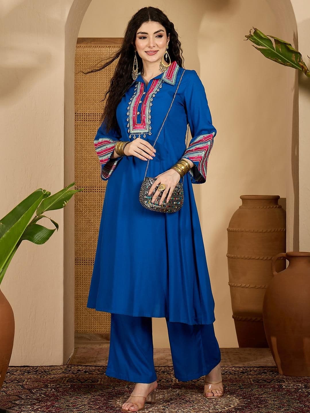 Sangria Women Solid & Embroidered Rayon A-Line Kurta Pant Set - view 1