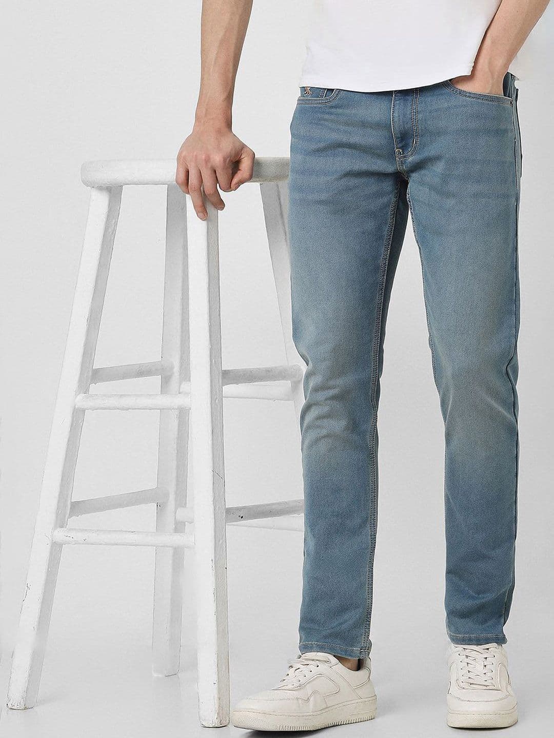 Peter England Casuals Men Slim Fit Low Distress Light Fade Jeans - view 1