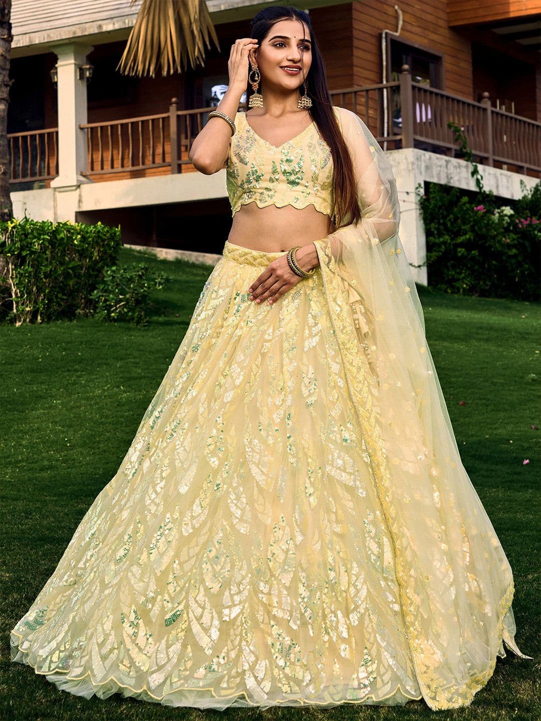 ETHNIC PLUS Yellow Embroidered Sequinned Semi-Stitched Net Lehenga & Blouse With Dupatta - view 1