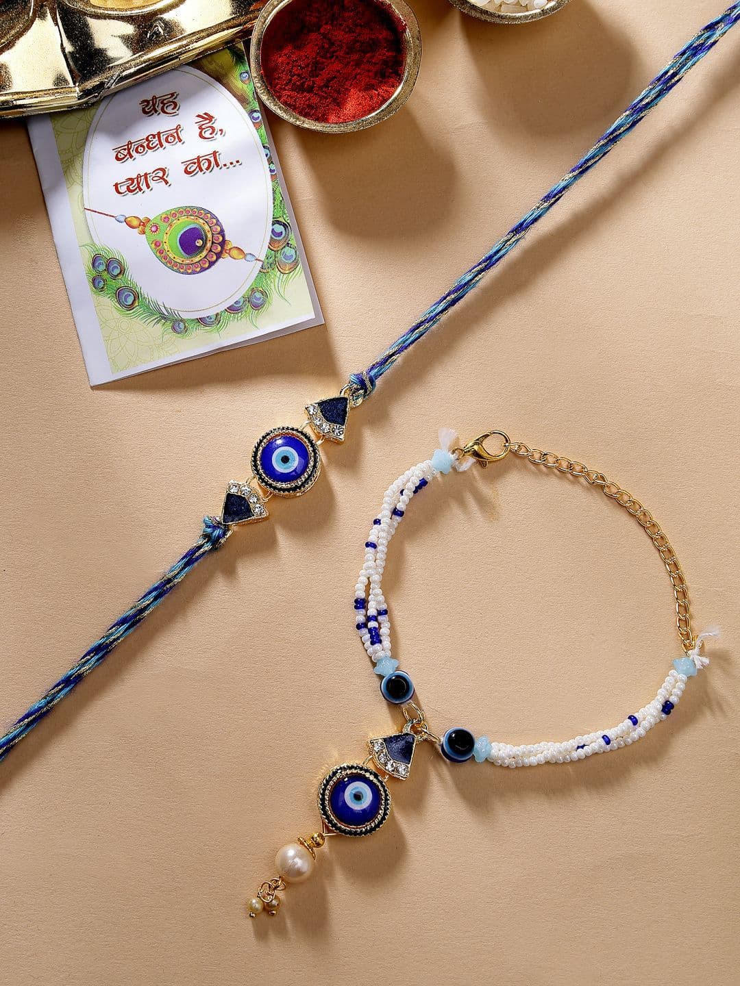 Sangria Unisex Set Of 2 Blue Evil Eye Bhaiya Bhabhi Rakhi With Roli Chawal - view 1