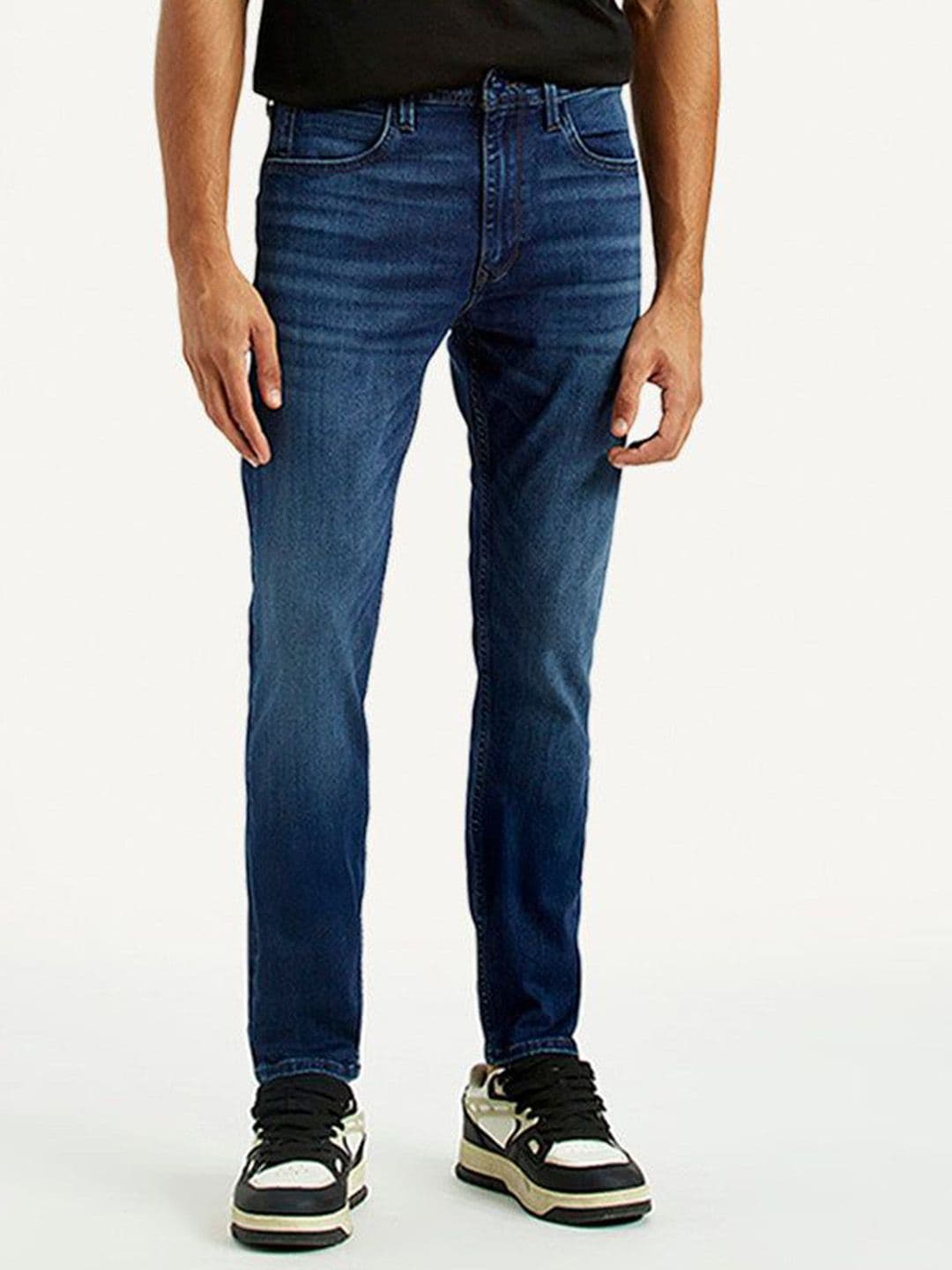 Levis Redloop Men 512 Tapered Fit Mid-Rise Light Fade Jeans - view 1