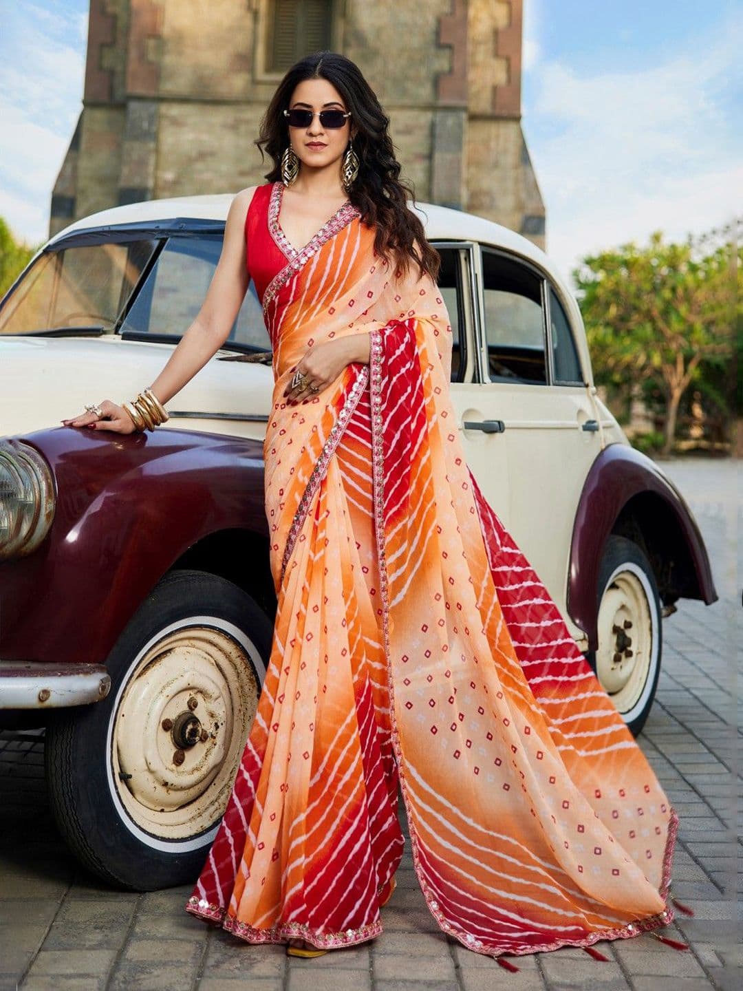 Kalista Bandhani Embellished Georgette Saree With Unstitched Blouse Piece - view 1