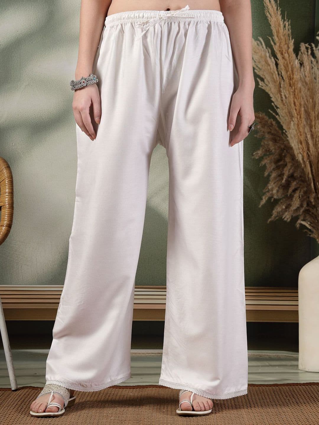 Clora Creation Women Solid Straight Regular Palazzos - view 1