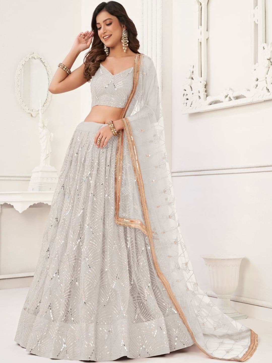 EthniQlo Off White Net Lehenga Choli In Sequins Work - view 1