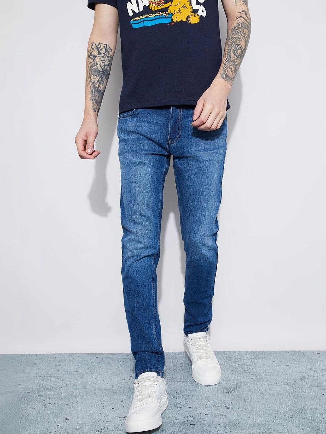 Fame Forever by Lifestyle Men Tapered Fit Mid-Rise Low Distress Stretchable Jeans - view 1