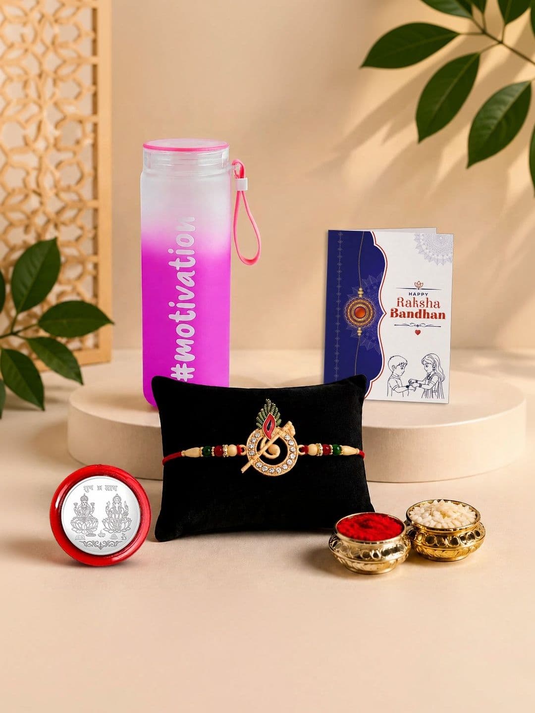 Myntra Elegant Homes Rakhi With Greeting Card Water Bottle Silver Coin & Roli Chawal - view 1
