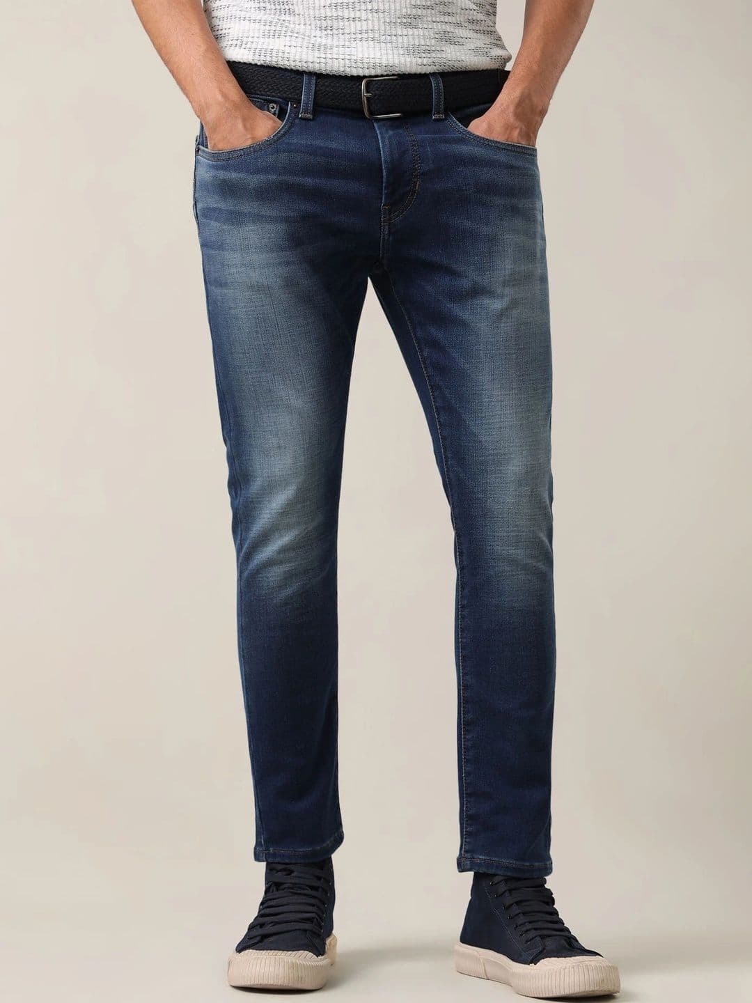 U.S. Polo Assn. Denim Co. Men Tapered Fit Mid-Rise Low Distress Jeans - view 1