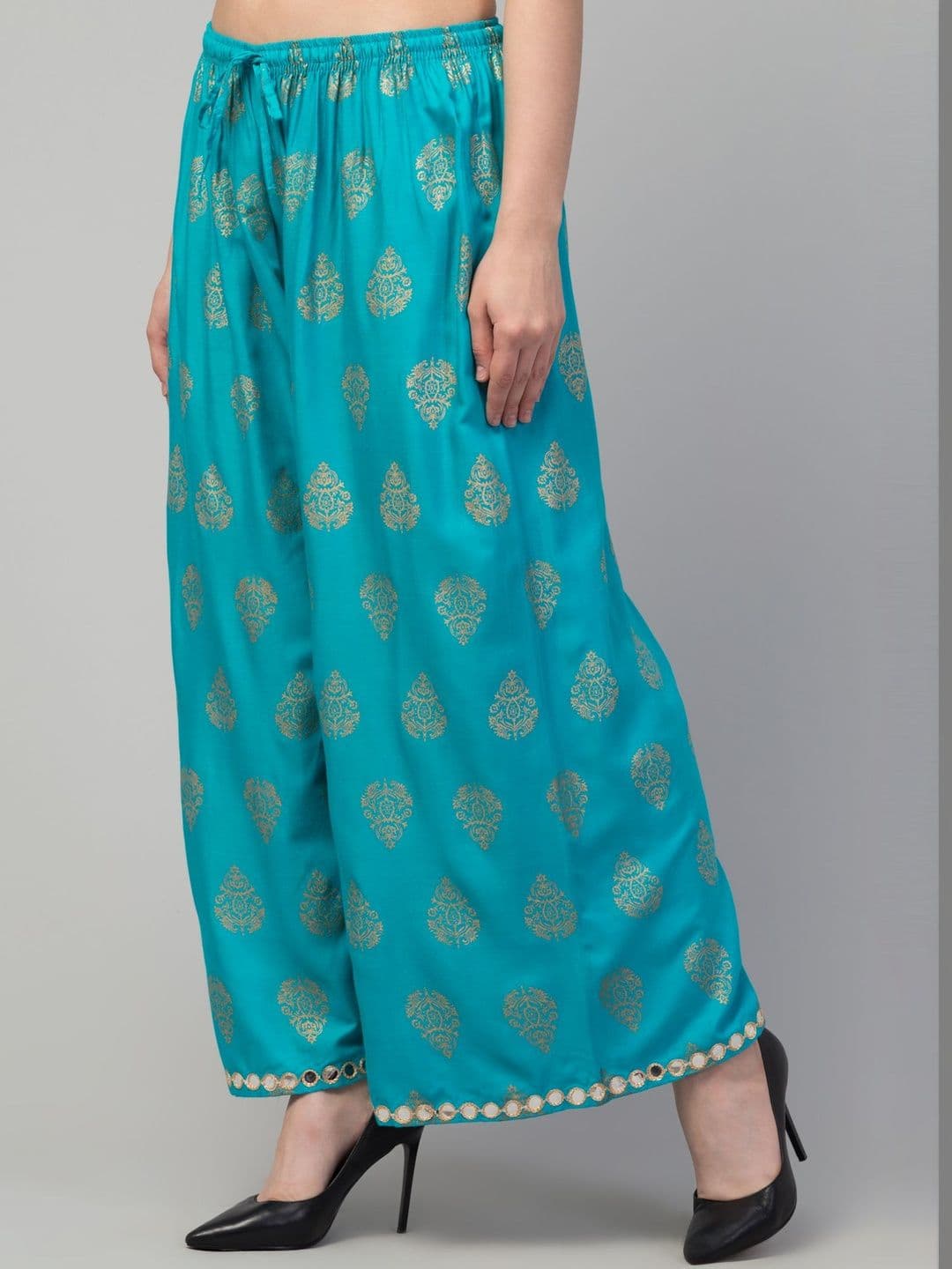 CROWN KING GARMENTS Women Ethnic Motifs Printed Flared Knitted Ethnic Palazzos - view 1