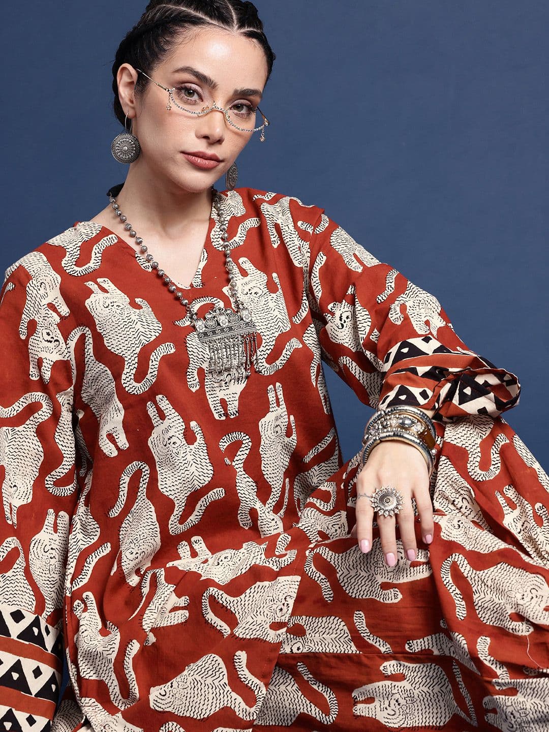 Taavi Women Rust Animal Printed V-Neck Kurta and Salwar Pants Ethnic Kurta Set - view 1