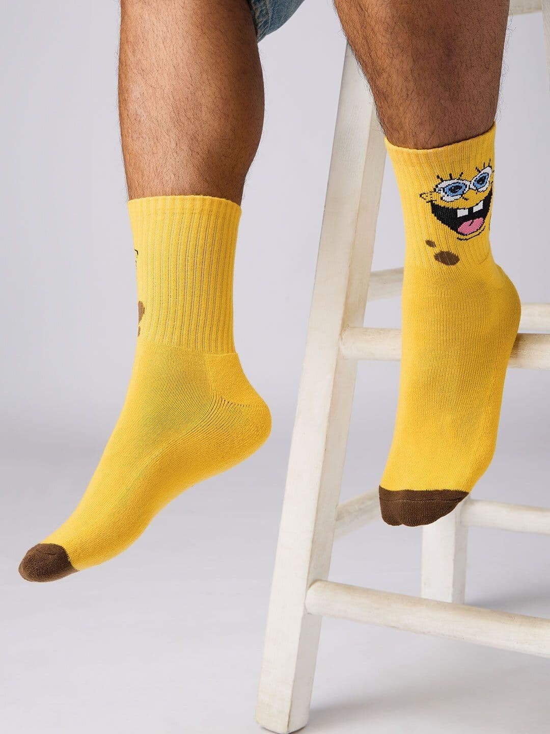 The Souled Store Unisex SpongeBob Yellow Cotton Crew Socks - view 1