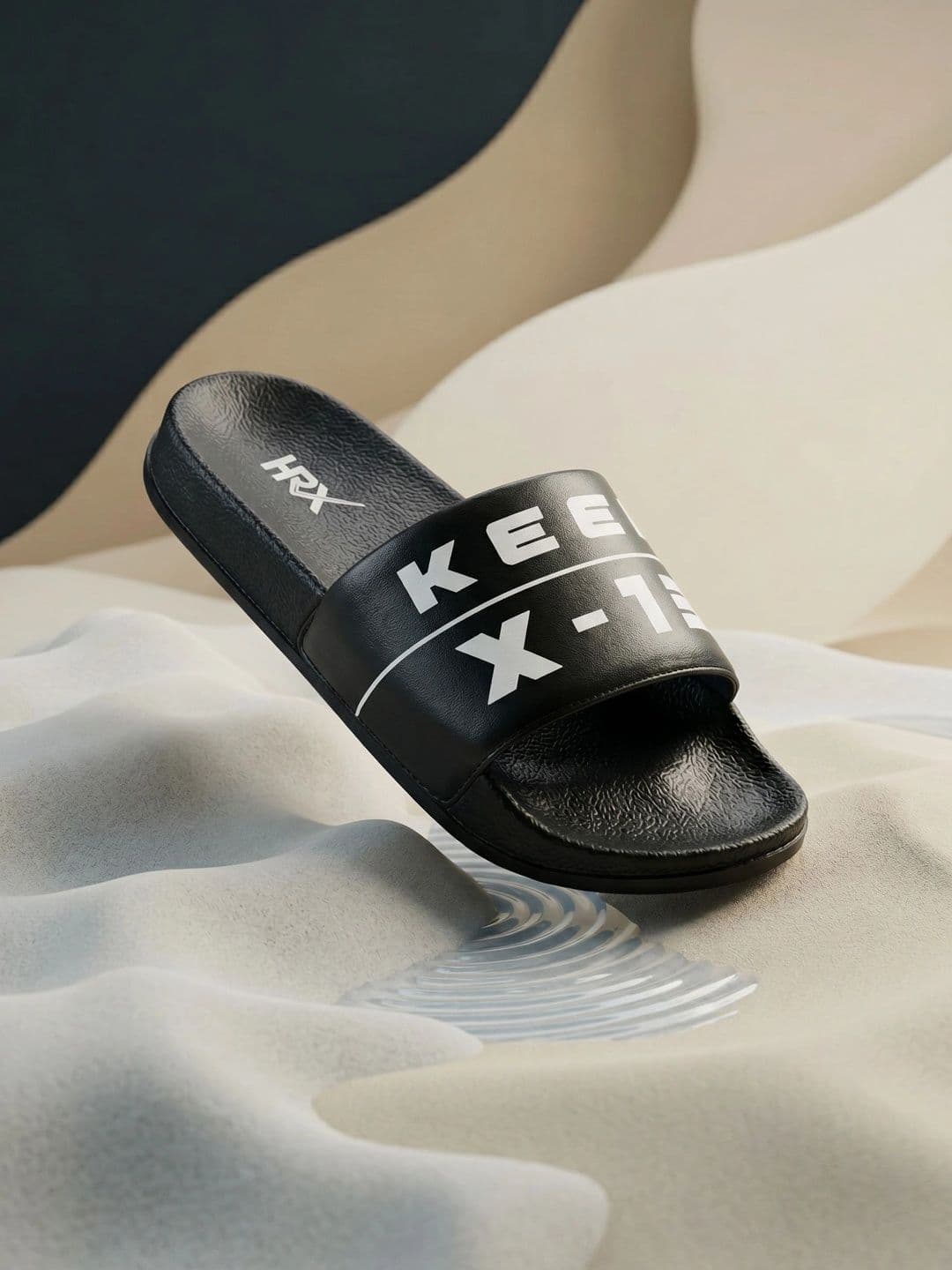 HRX by Hrithik Roshan Men Black & White Printed Sliders - view 1
