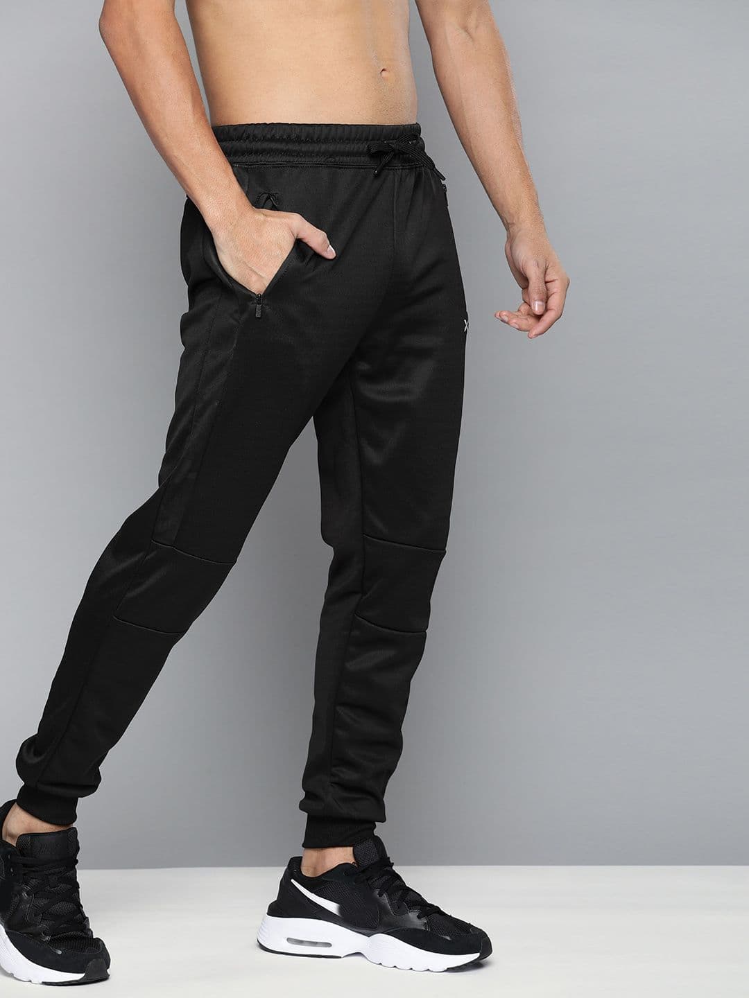 HRX by Hrithik Roshan Men Jet Black Solid Slim Fit Training Track Pants - view 1