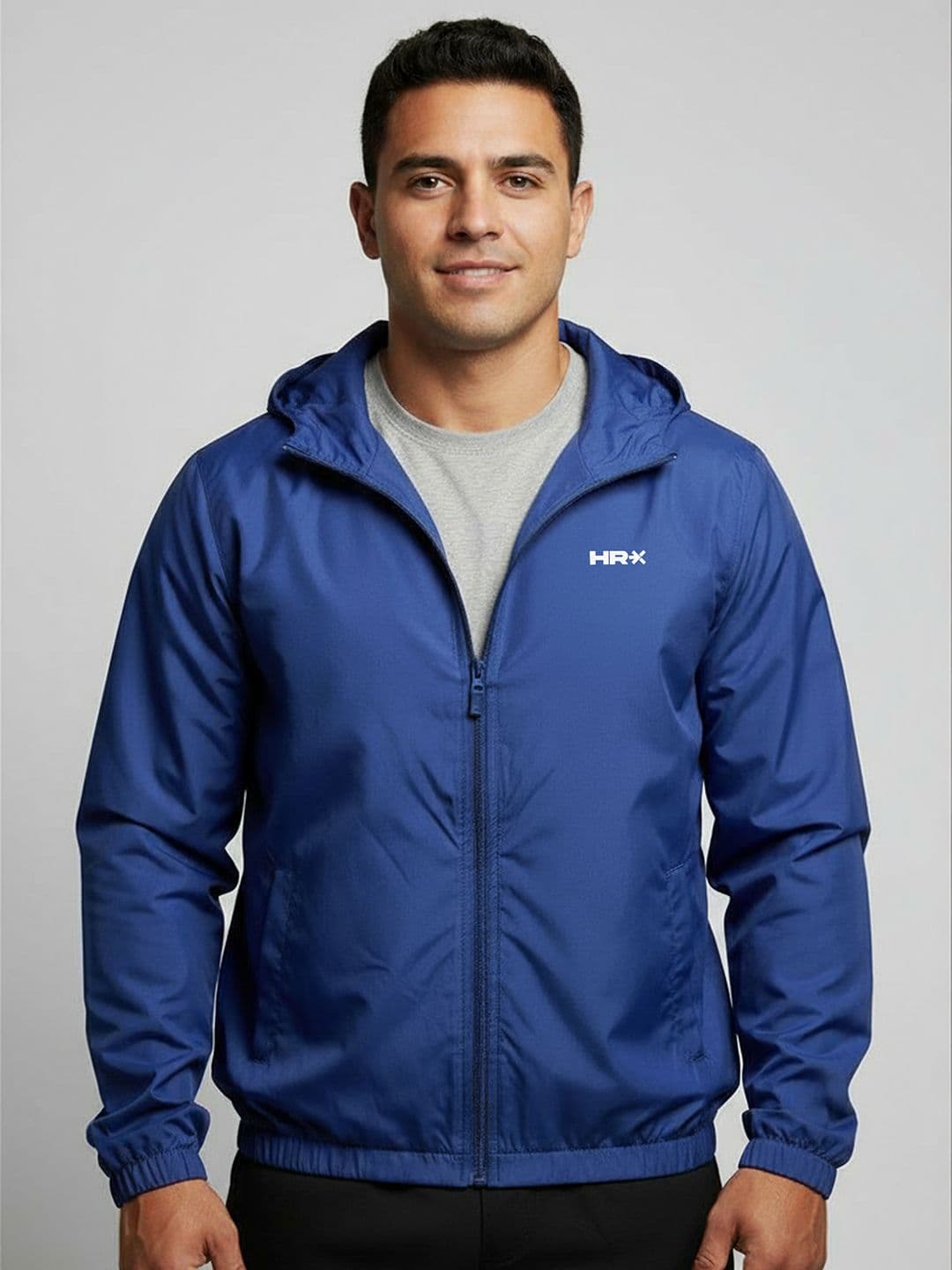 HRX by Hrithik Roshan Men Hooded Solid Windcheater Sporty Jacket - view 1