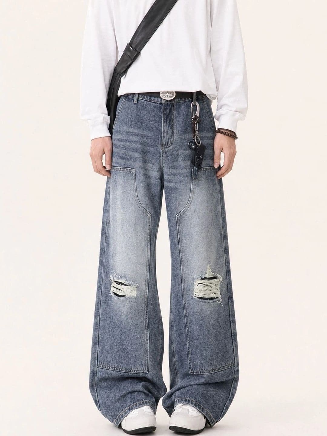 StyleCast x Revolte Men Wide Leg Mid-Rise Highly Distressed Light Fade Jeans - view 1