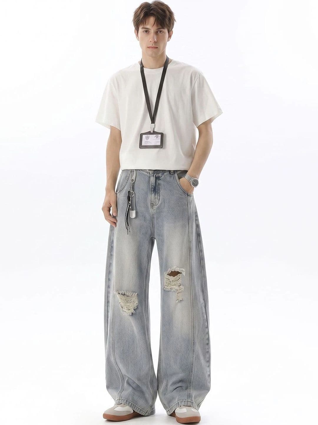 StyleCast x Revolte Men Wide Leg Mid-Rise Highly Distressed Light Fade Jeans - view 1