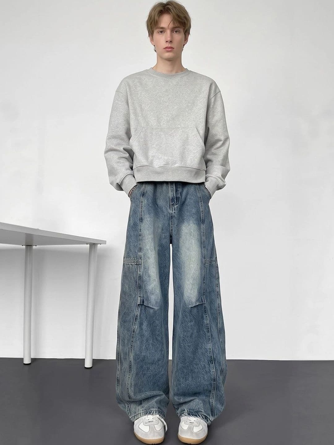StyleCast x Revolte Men Wide Leg Mid-Rise Low Distress Light Fade Jeans - view 1
