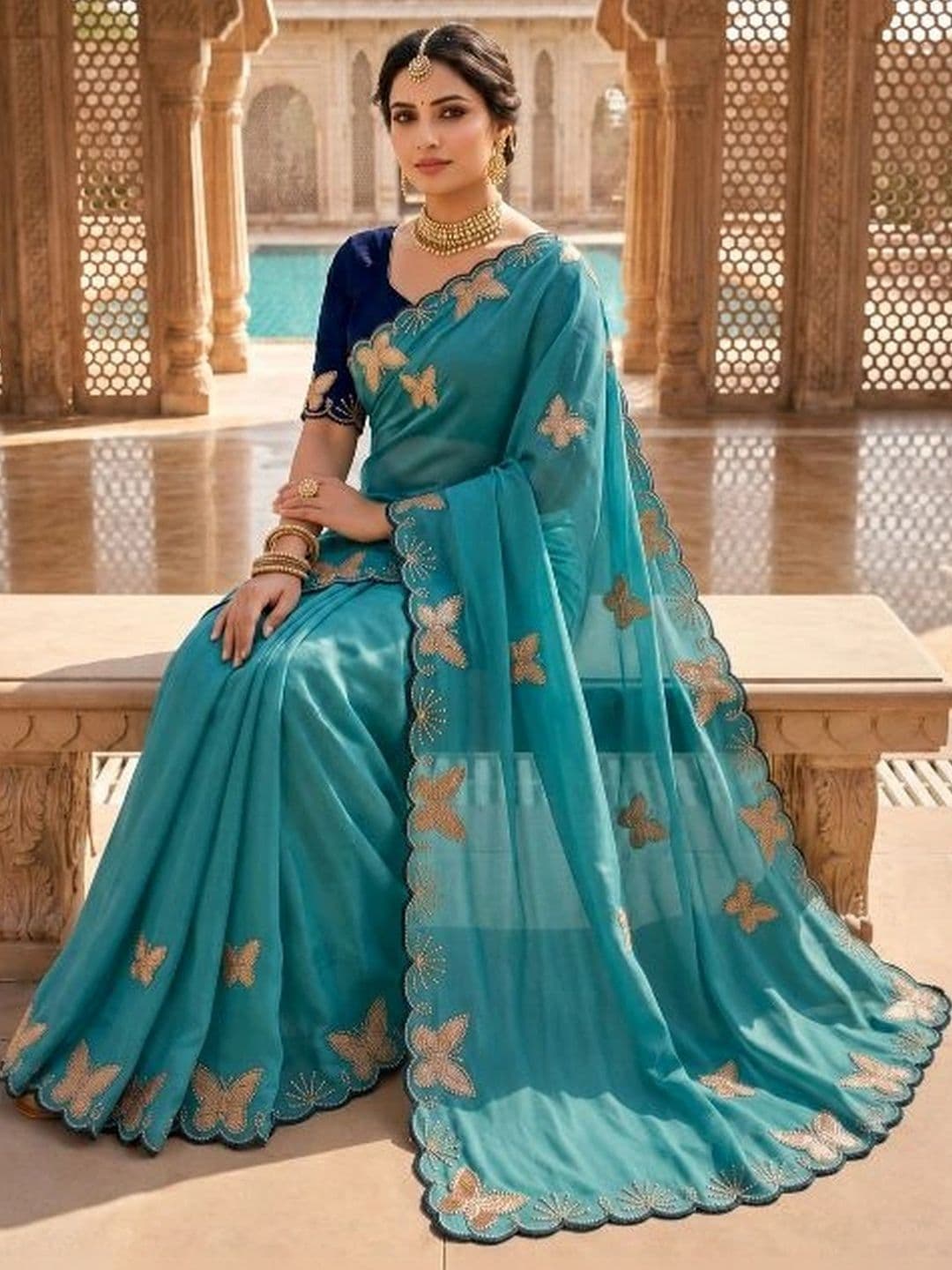 A.K. FABRICS Ethnic Motifs Embroidered Pure Georgette Saree - view 1