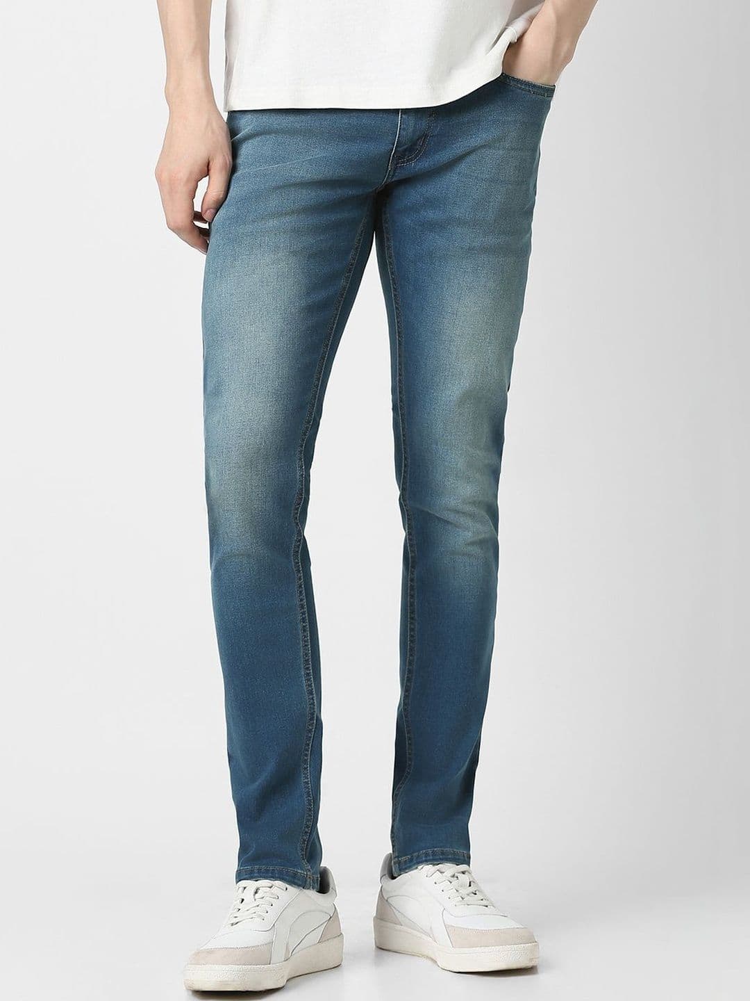 Peter England Casuals Men Tapered Fit Mid-Rise Low Distress Jeans - view 1