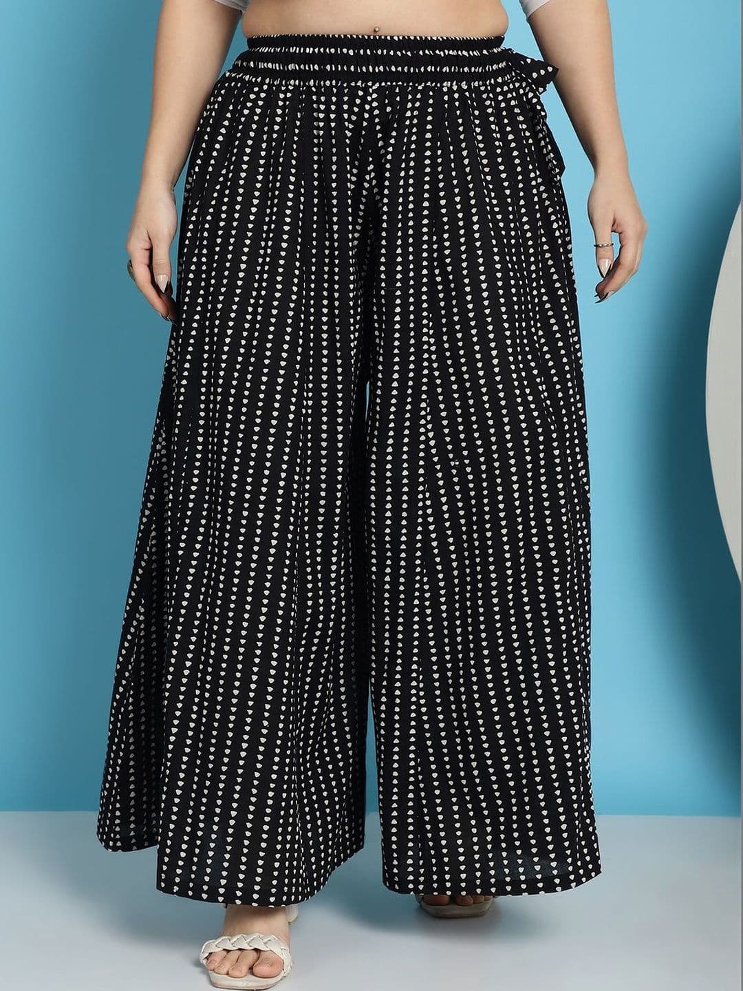 KALINI Women Printed Flared Knitted Ethnic Palazzos - view 1