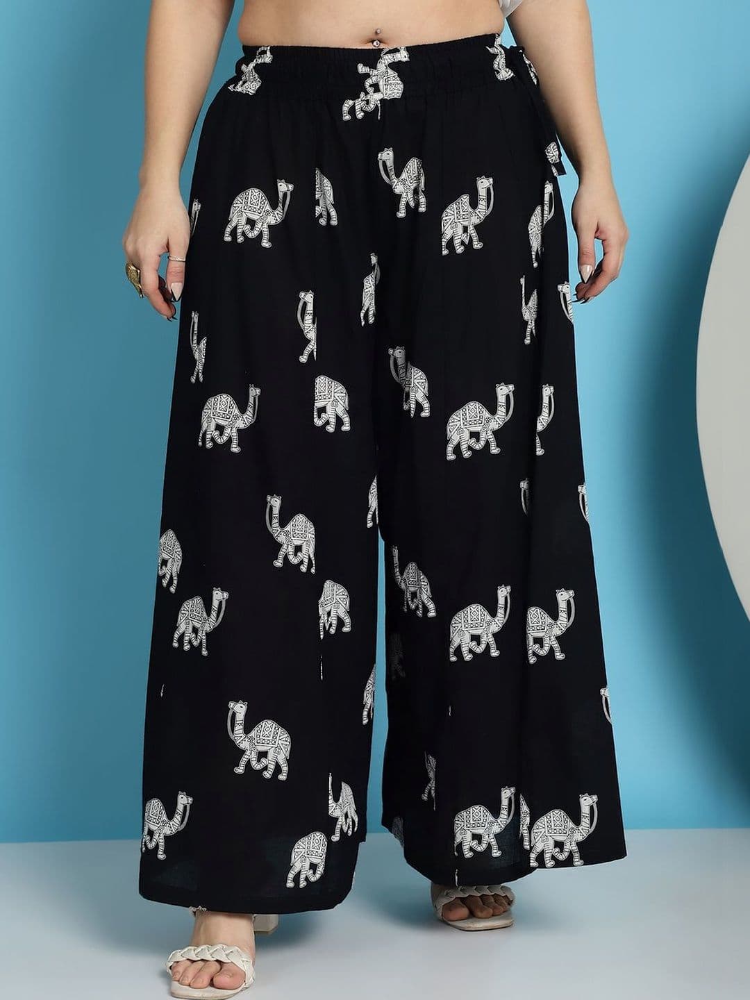 KALINI Women Ethnic Motifs Printed Flared Knitted Ethnic Palazzos - view 1
