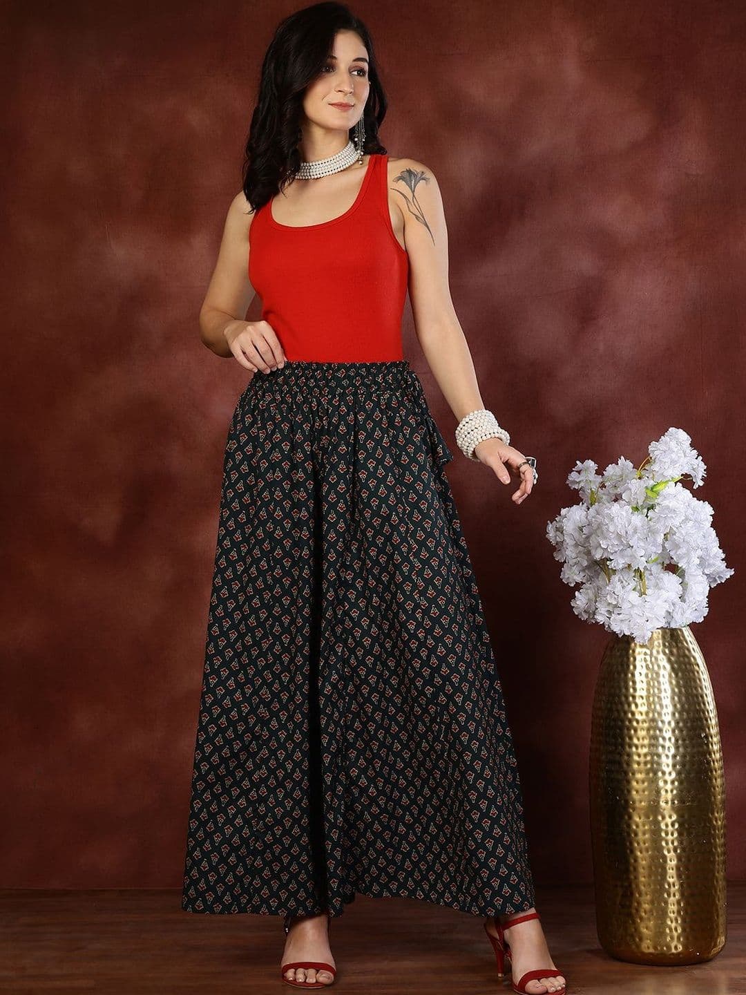 KALINI Women Ethnic Motifs Printed Flared Knitted Ethnic Palazzos - view 1