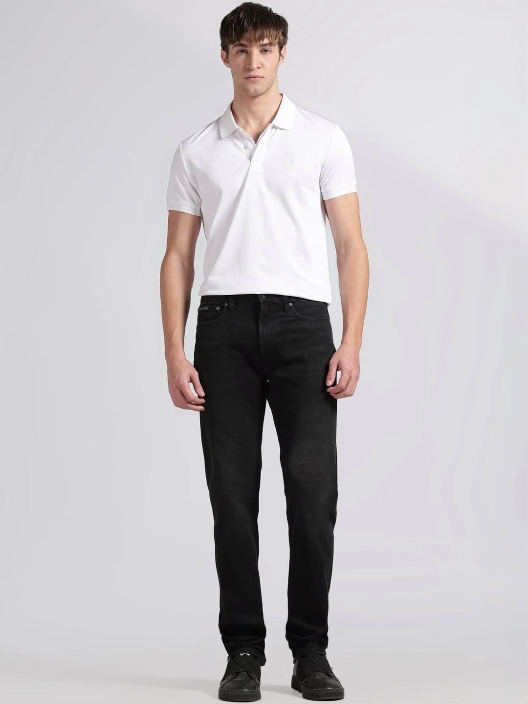Calvin Klein Jeans Men Slim Fit Mid-Rise Light Fade Jeans - view 1