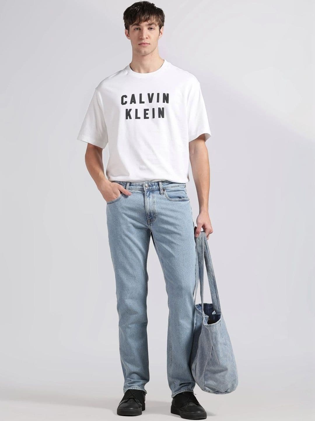 Calvin Klein Jeans Men Slim Fit Mid-Rise Light Fade Jeans - view 1