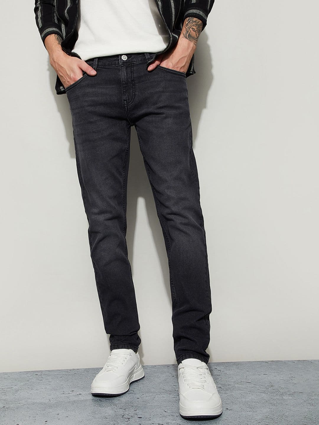 Fame Forever by Lifestyle Men Tapered Fit Mid-Rise Light Fade Jeans - view 1