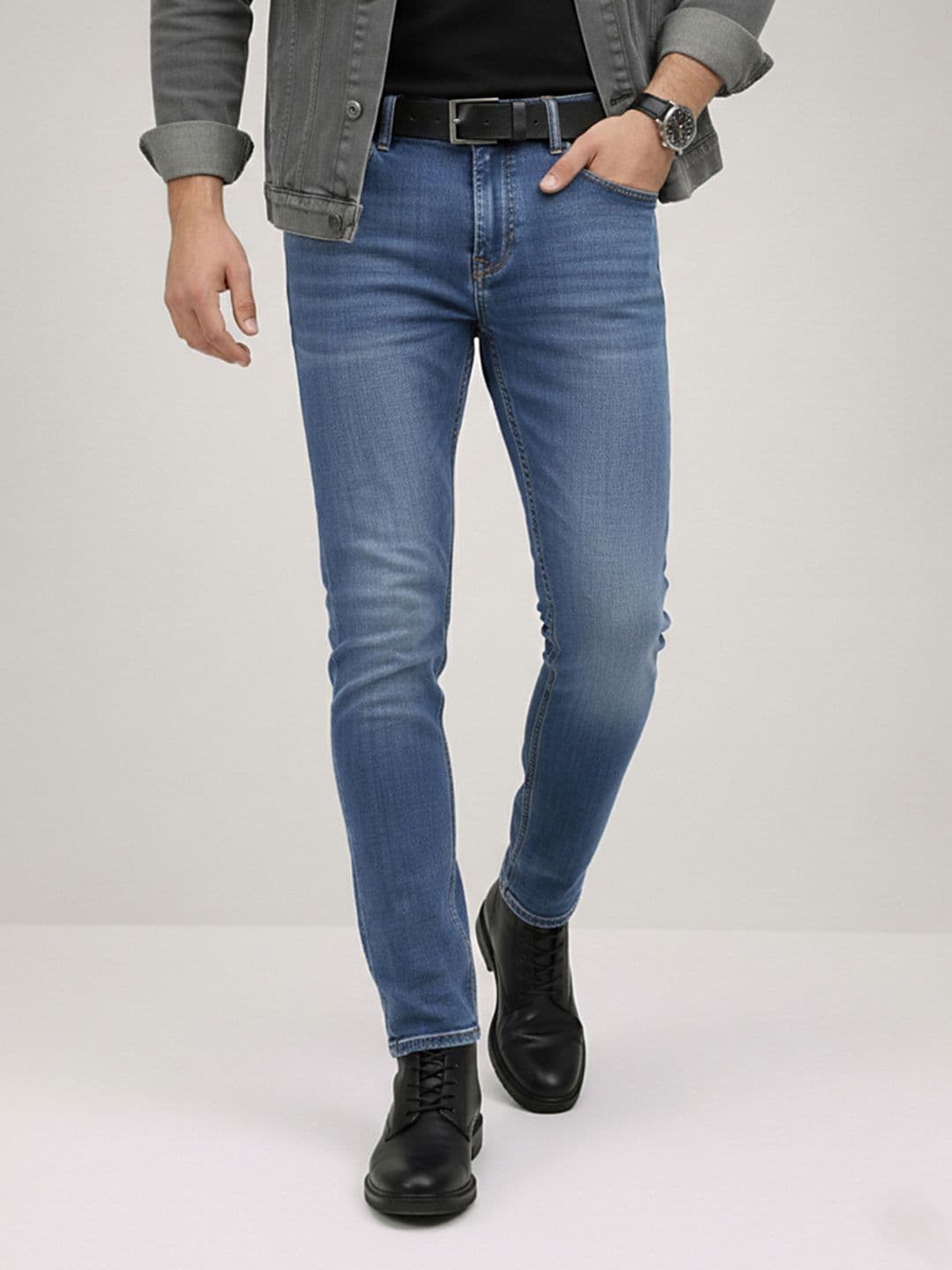 The Roadster Life Co. Men Slim Fit Mid-Rise Light Fade Stretchable Jeans With Bag - view 1