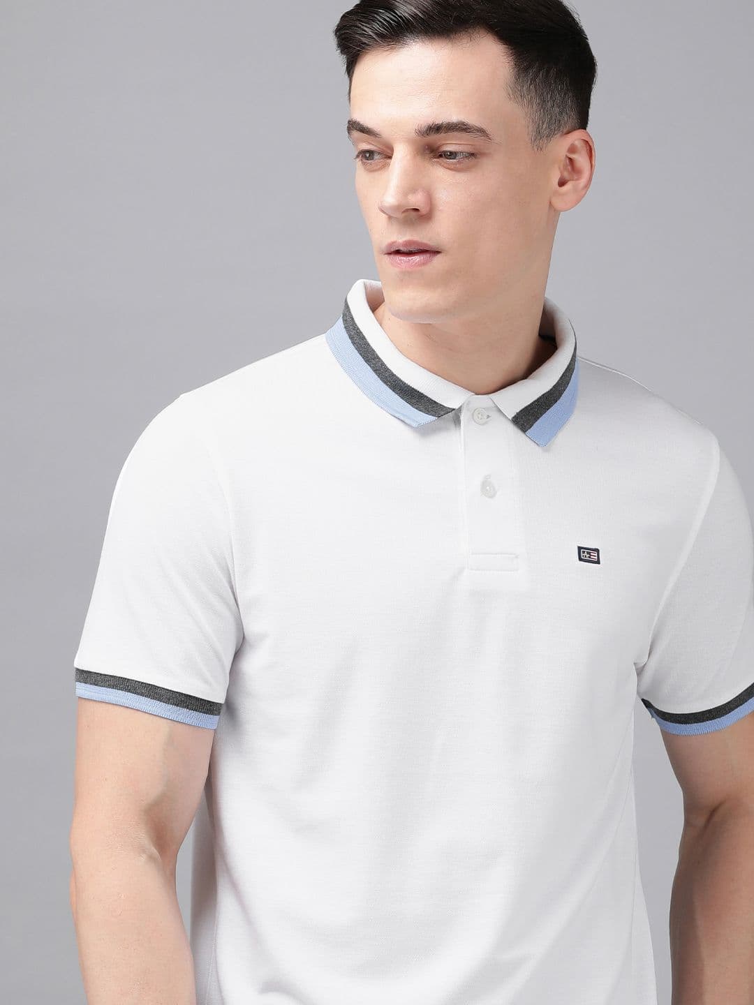 Arrow Sport Men Solid Short Sleeves Polo Collar T-shirt - view 1