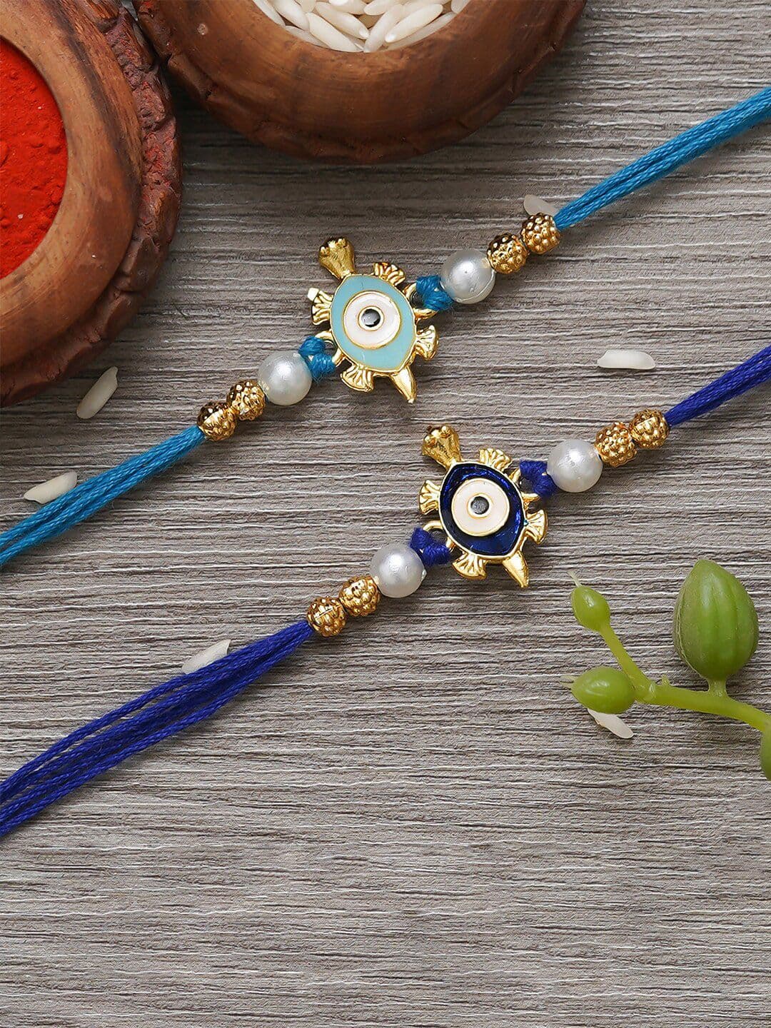 eCraftIndia Unisex Set Of 2 Evil Eye Tortoise Charm Rakhi With Roli Chawal - view 1