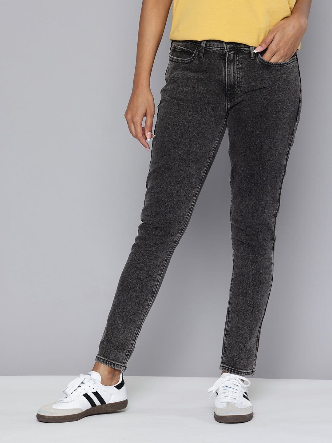 Levis Women's 711 Black Skinny Fit Mid Rise Jeans - view 1