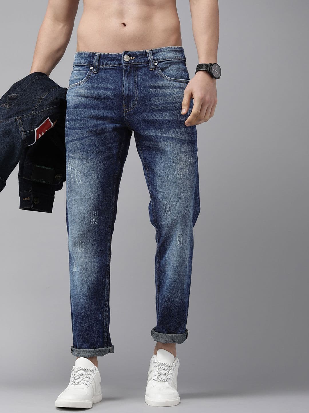 The Roadster Lifestyle Co. Men Blue Slim Fit Low Distress Light Fade Stretchable Jeans - view 1